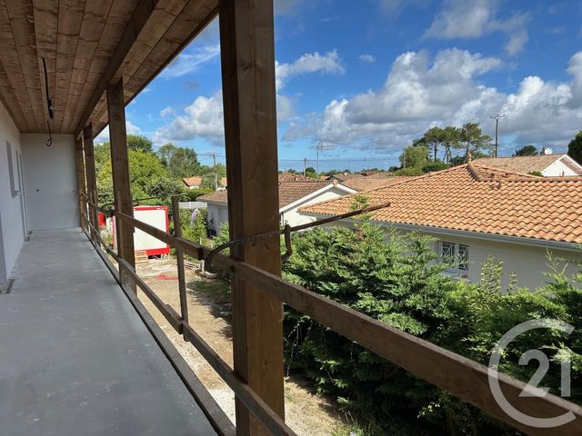 Appartement T2 à vendre - 2 pièces - 50.78 m2 - GUJAN MESTRAS - 33 - AQUITAINE - Century 21 Duprat & Associés